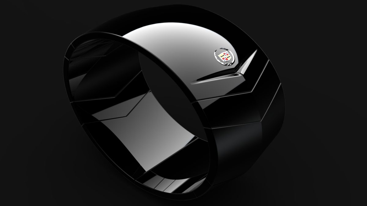 The Dextera bracelet: a glossy black, faceted wristband carrying motion sensors, with the Cadillac crest centred on top.