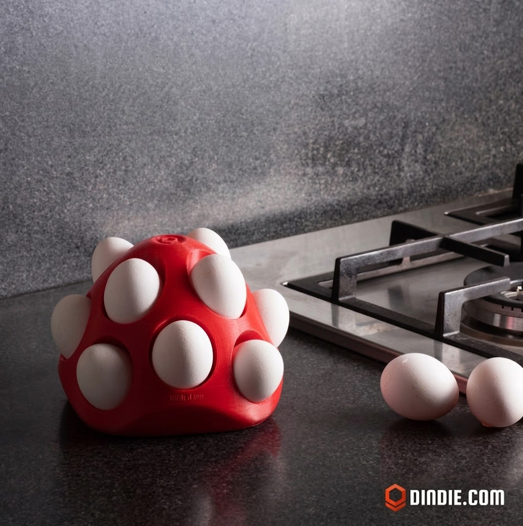 Shelly egg holder in use on a kitchen counter, holding nine eggs